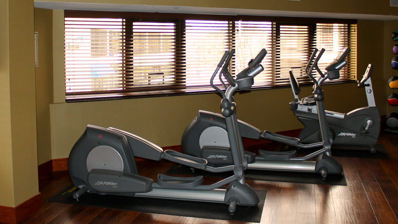 Photo of ellipticals in a weight room